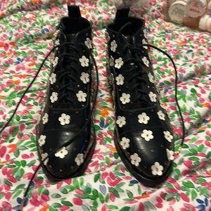 Brand new fabulous and groovy never worn black low designer boots